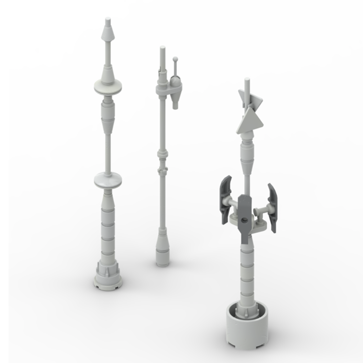 Three gray tall antennas build with small building bricks are displayed on a white background.