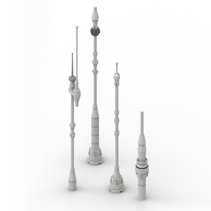 Four gray tall antennas build with small building bricks are displayed on a white background.