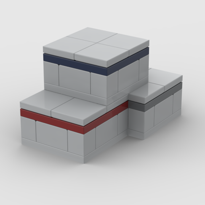 Three gray cargo boxes build with little bricks are stacked together. The top cargo box has a blue stripe, the middle has a red stripe, and the lowest has a dark gray stripe around their sides.